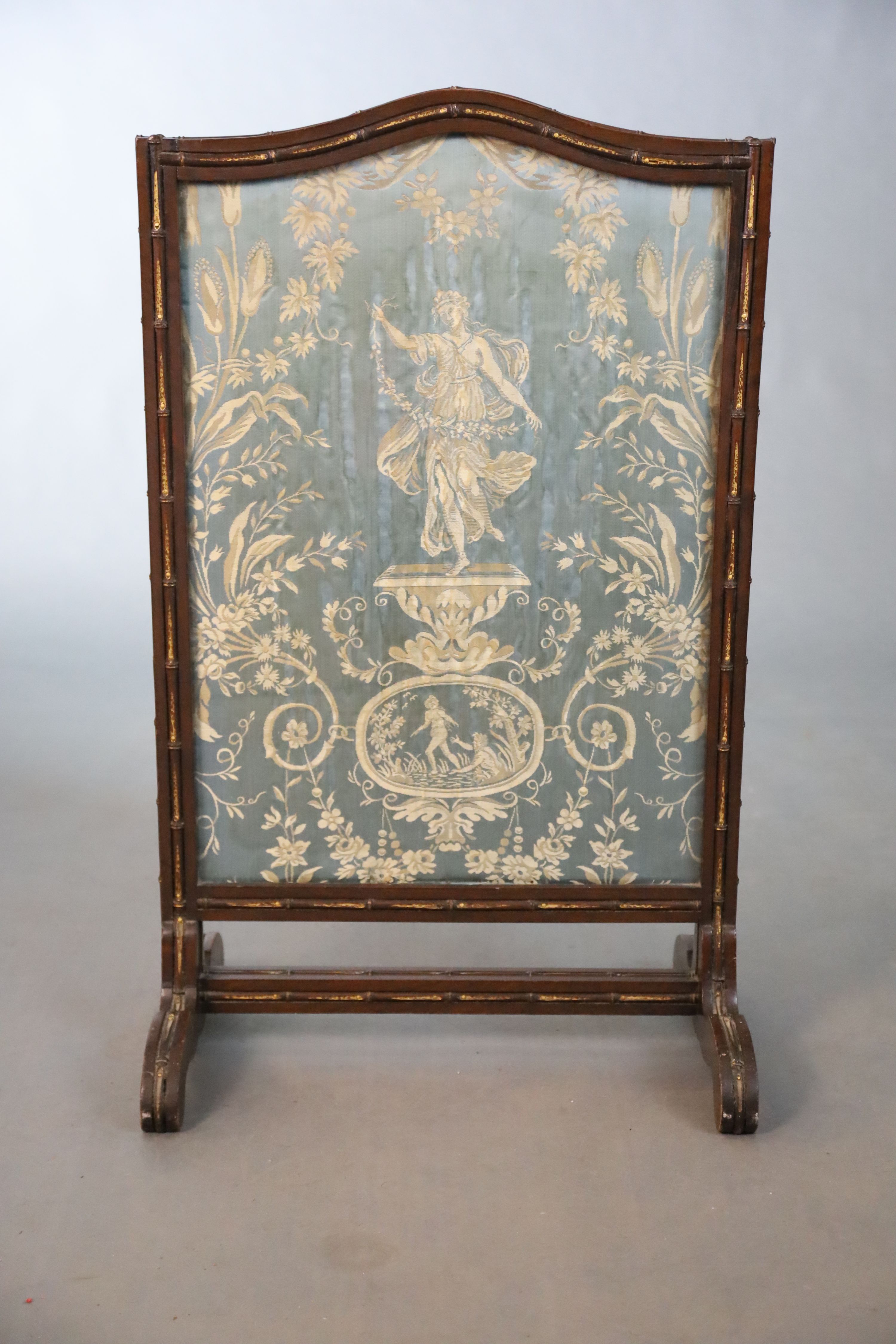 An Edwardian parcel gilt simulated bamboo fire screen, W.54.5cm H.88.5cm